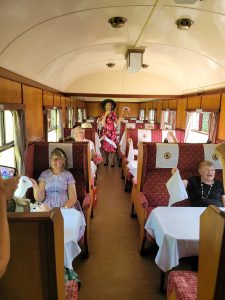 Jayne Darling singing on a steam train at Ecclesbourne Valley Railway